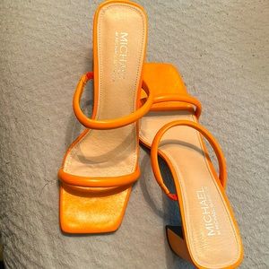 Orange heels for sale! Never worn